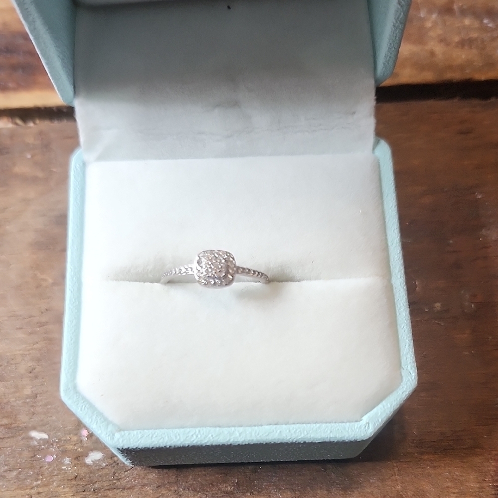 Elegant Silver Ring with Diamond Accents